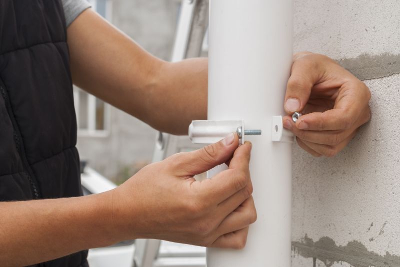 Downspout Reattachment in Boulder, CO